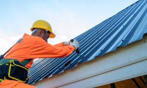 Roof Underlayment Construction Worker